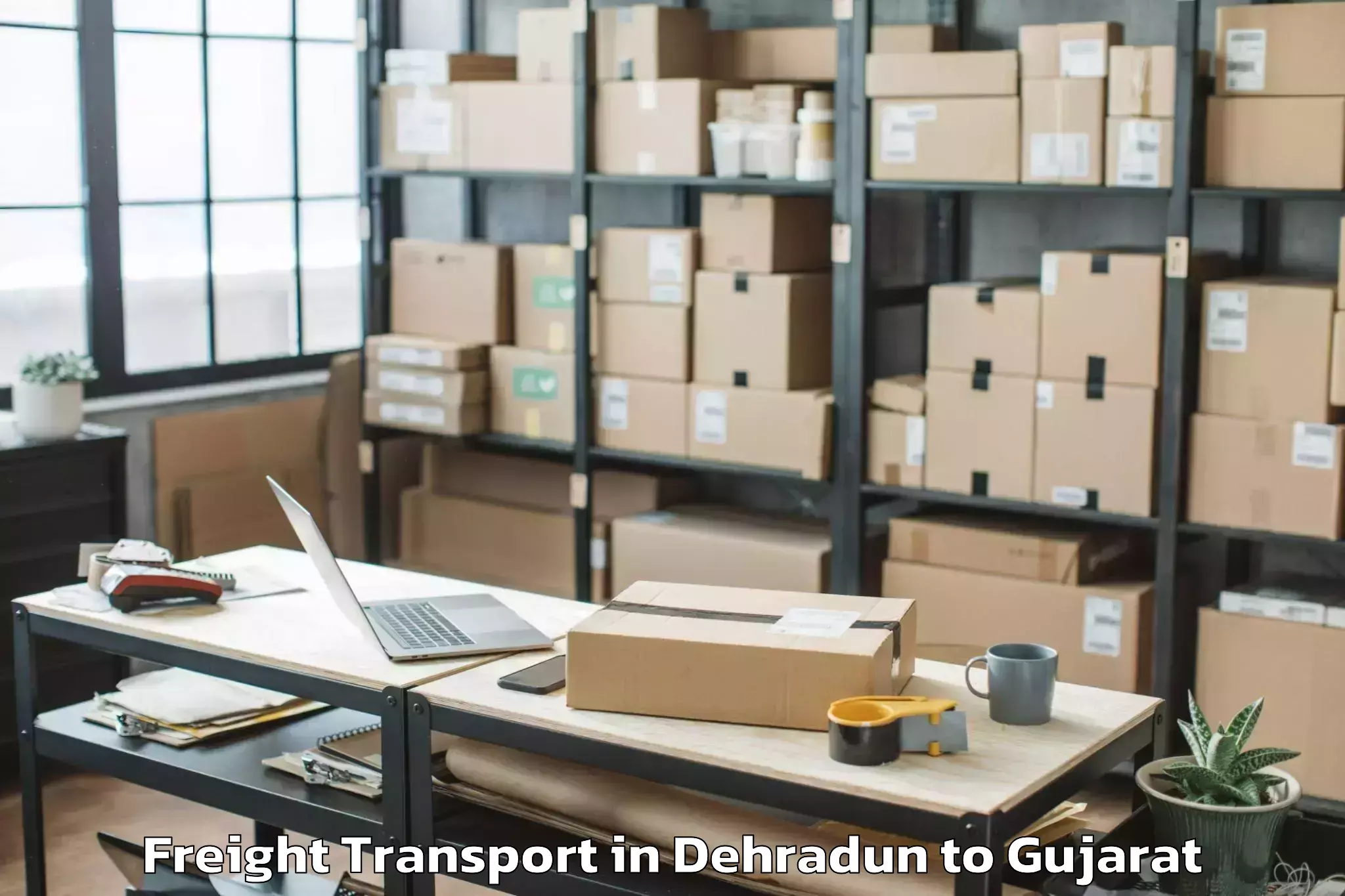 Trusted Dehradun to Karjan Freight Transport